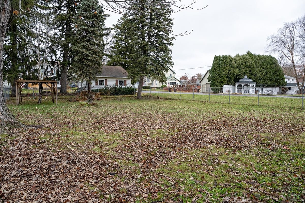 503 West 2nd Street Byron, IL 61010 - Photo 52 of 56 a front view of a house with a yard