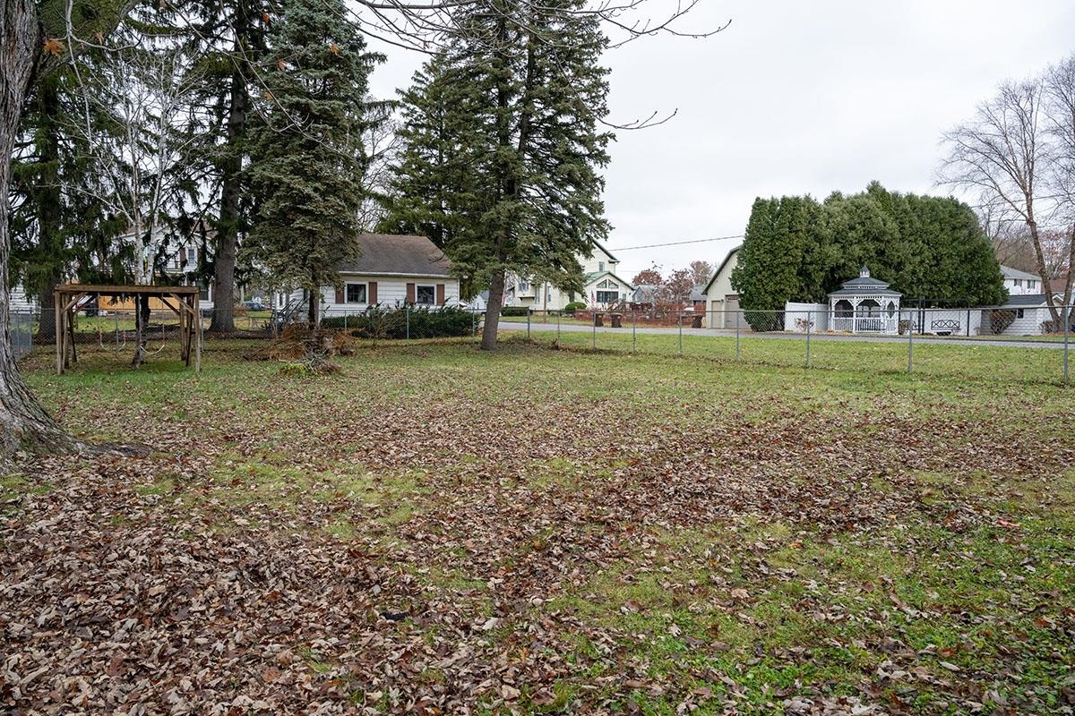 503 West 2nd Street Byron, IL 61010 - Photo 53 of 56 a front view of a house with a yard