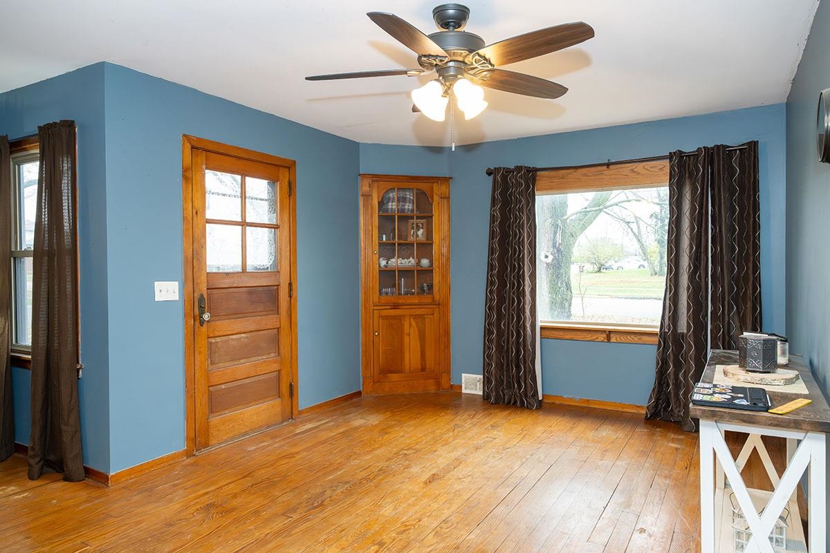 503 West 2nd Street Byron, IL 61010 - Photo 7 of 56 a view of a livingroom with a window and a kitchen