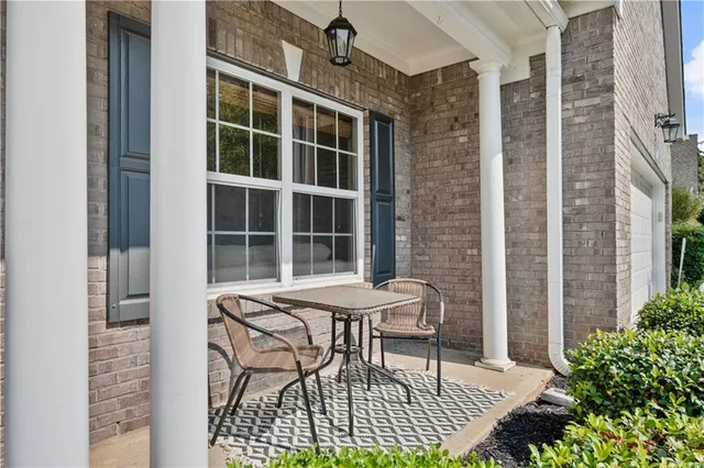 a front view of a house with a porch