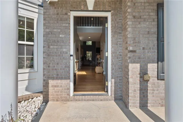 a front view of a house with a glass door