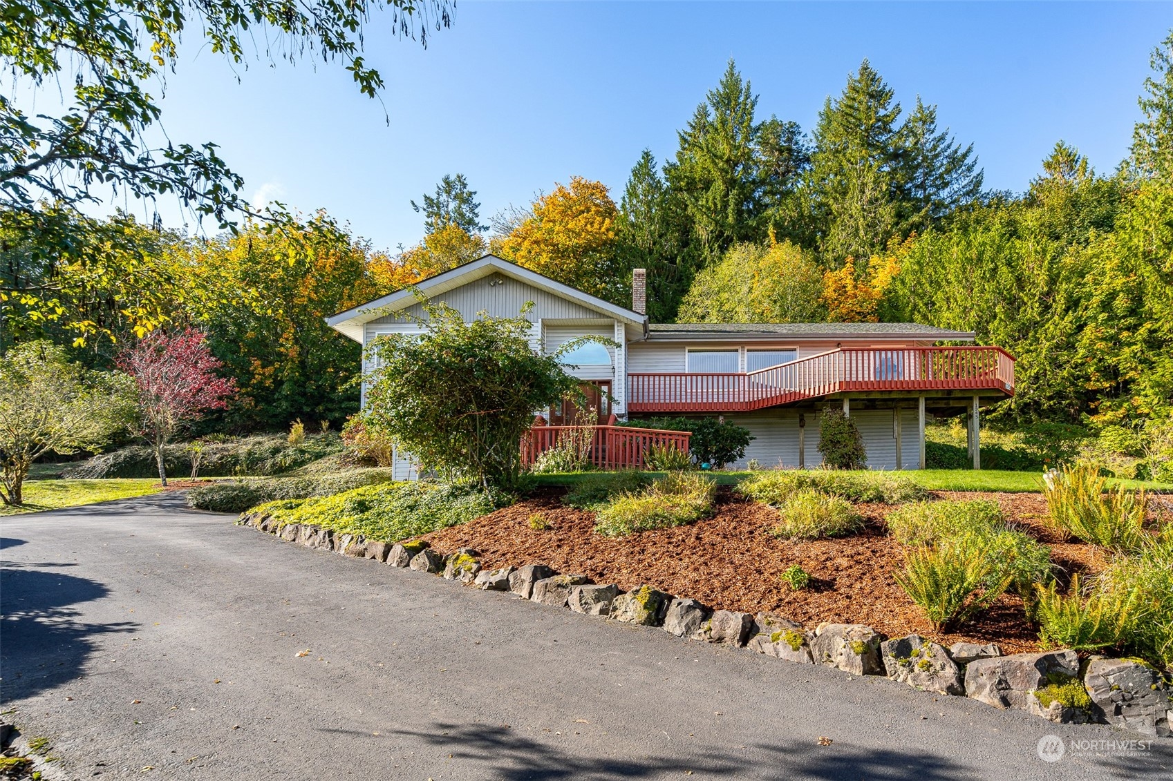 1345 Pleasant Valley Road Chehalis, WA 98532 - Photo 1 of 40 a front view of a house with a yard and potted plants