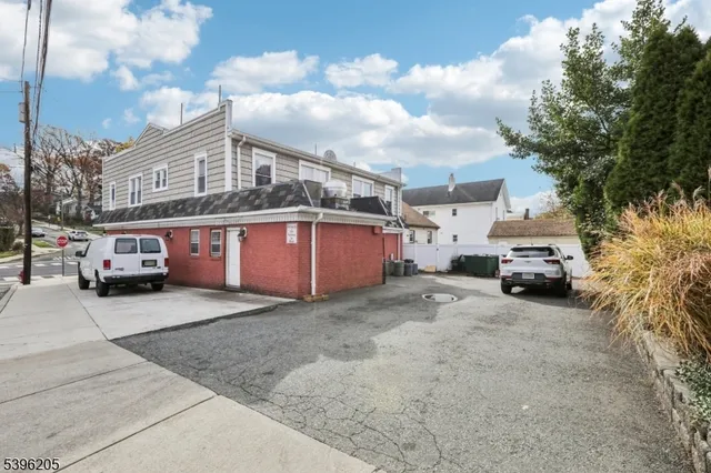 a view of a car park in front of a building