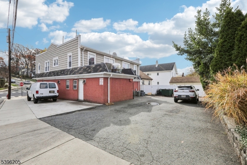 507 Bloomfield Avenue Nutley, NJ 07110 - Photo 24 of 26 a car parked in front of a house