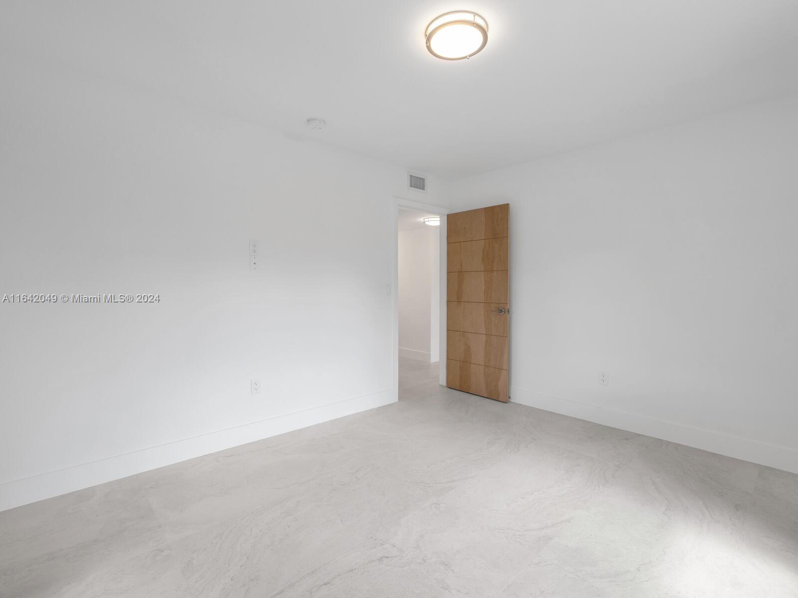 5991 Southwest 45th Street Miami, FL 33155 - Photo 30 of 35 a view of an empty room