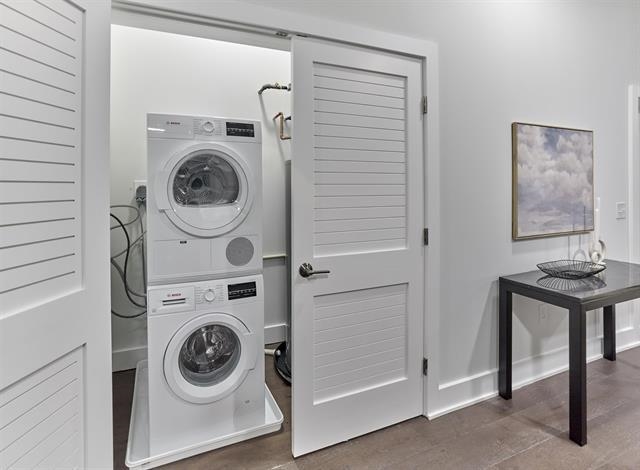 260 Ave East, Unit 609 Bayonne, NJ 07002 - Photo 12 of 24 a utility room with dryer and washer