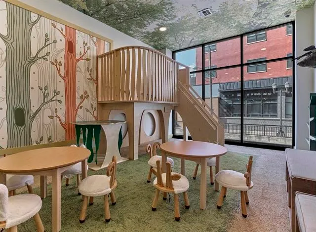 a balcony with furniture and potted plants