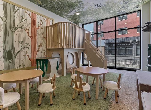 260 Ave East, Unit 609 Bayonne, NJ 07002 - Photo 15 of 24 a bathroom with a sink a toilet and a mirror