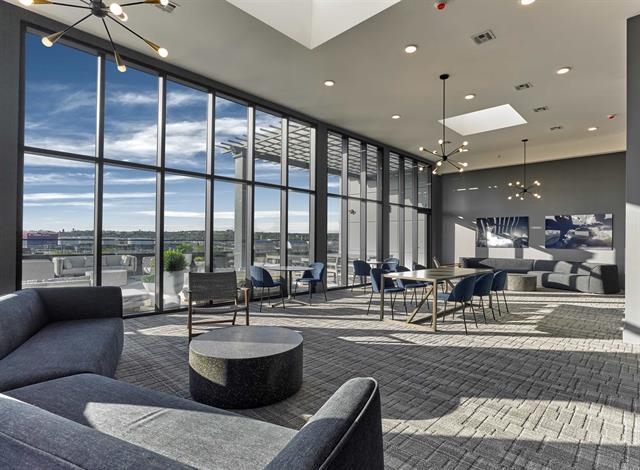 260 Ave East, Unit 609 Bayonne, NJ 07002 - Photo 20 of 24 a living room with patio furniture and a large window