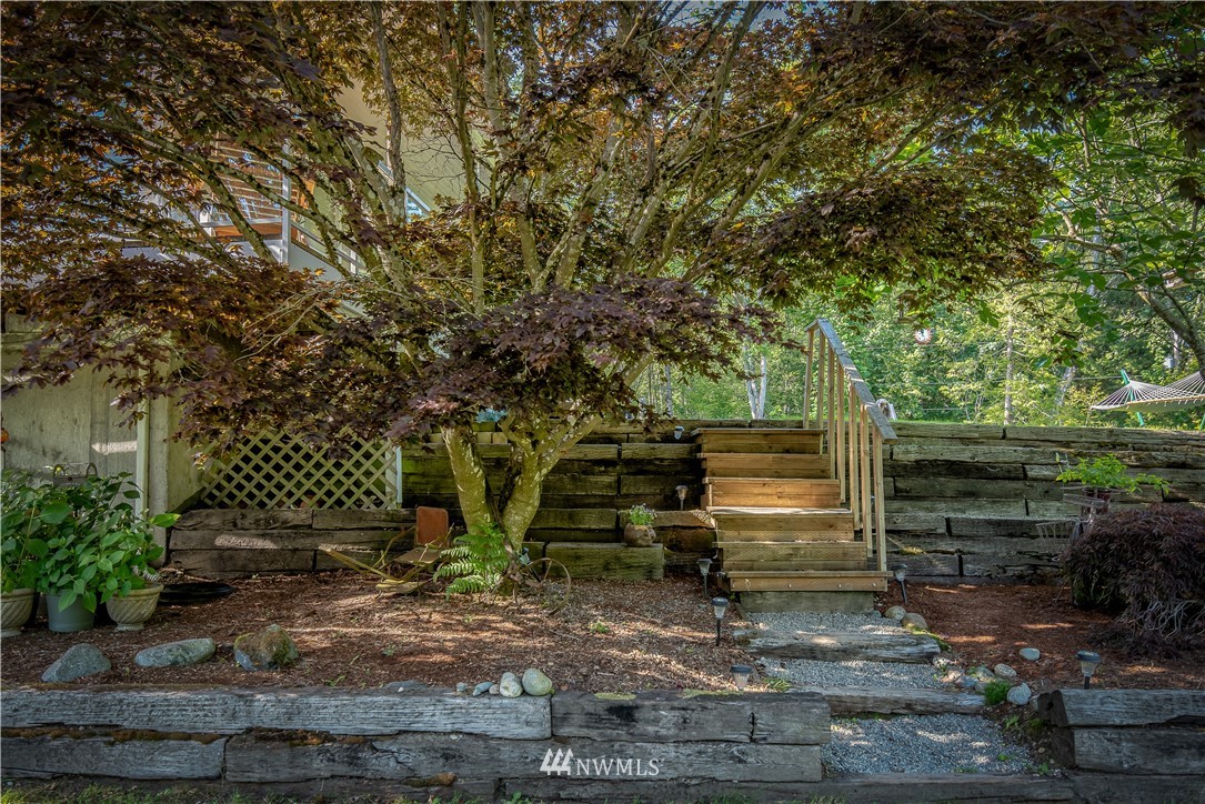 3635 H Street Road Blaine, WA 98230 - Photo 14 of 16 a backyard of a house with lots of green space