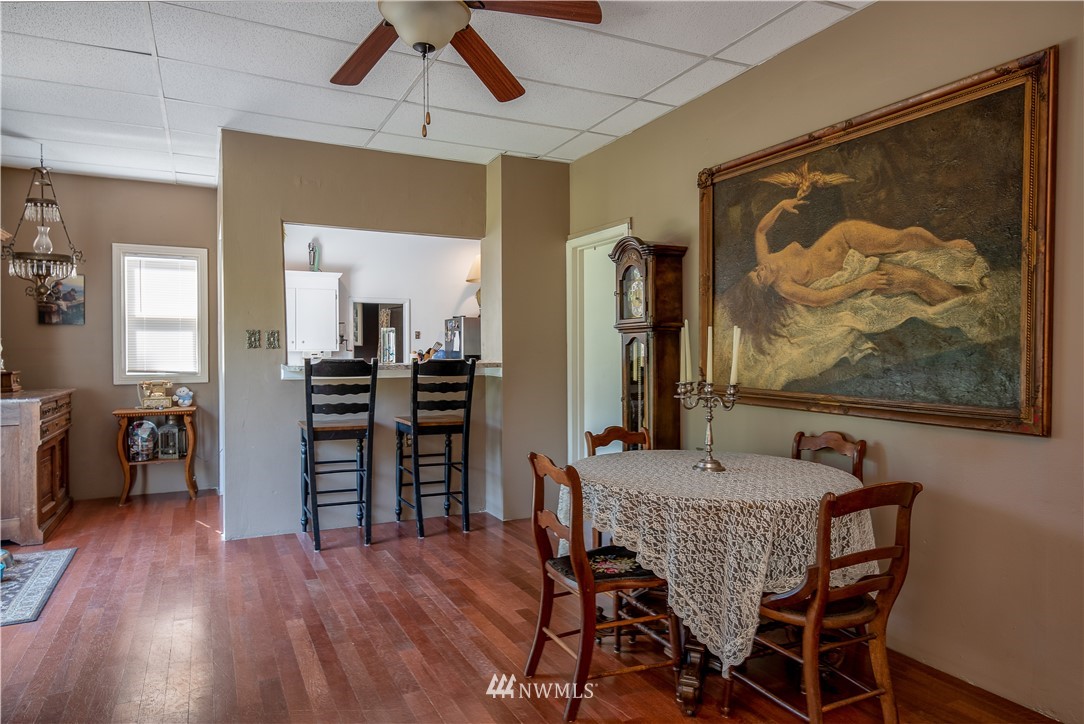 3635 H Street Road Blaine, WA 98230 - Photo 5 of 16 a view of a dining room with furniture and wooden floor