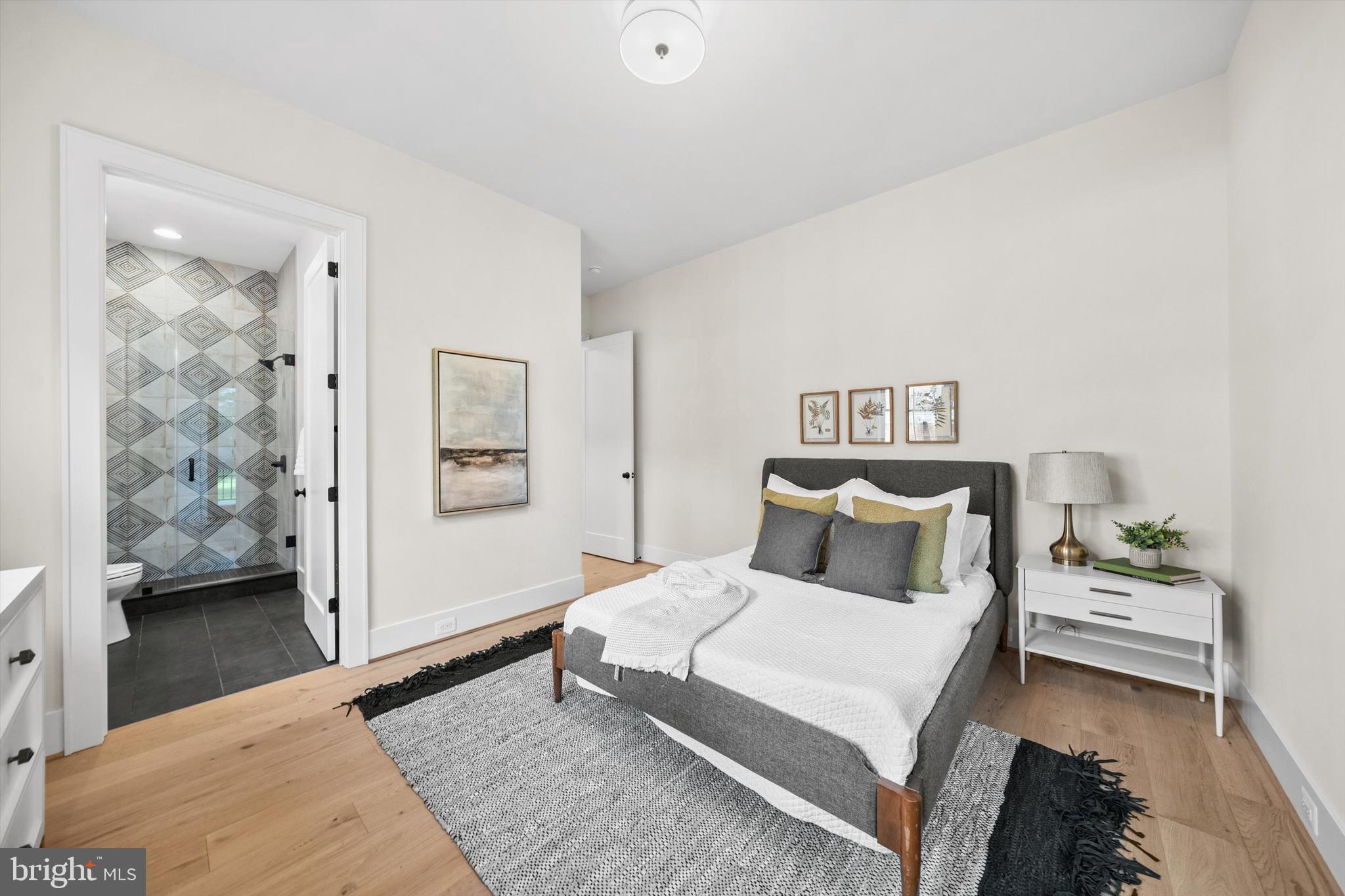 6807 29th Street North Arlington, VA 22213 - Photo 18 of 36 a bedroom with a bed and a view of kitchen