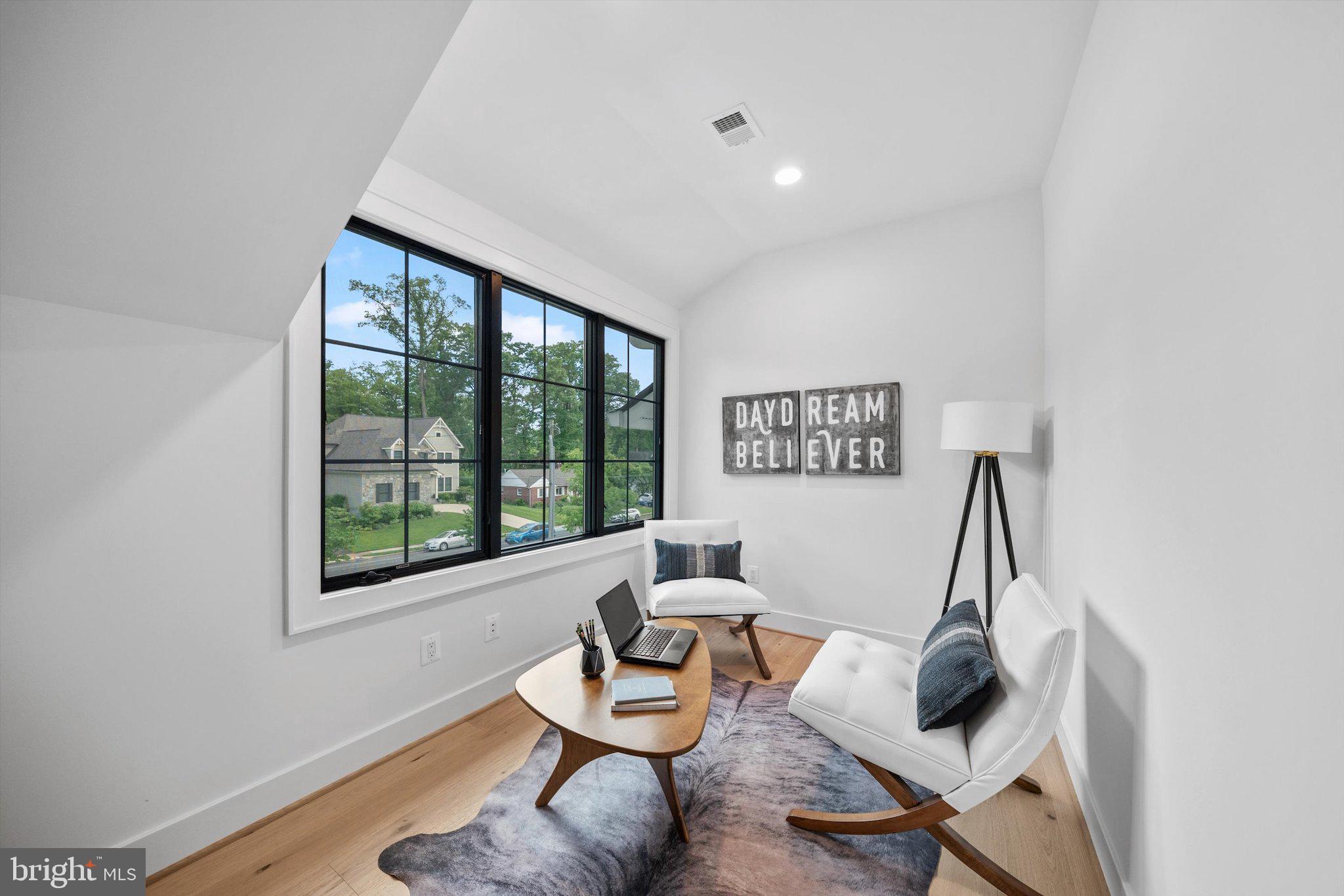 6807 29th Street North Arlington, VA 22213 - Photo 20 of 36 a living room with furniture and a window