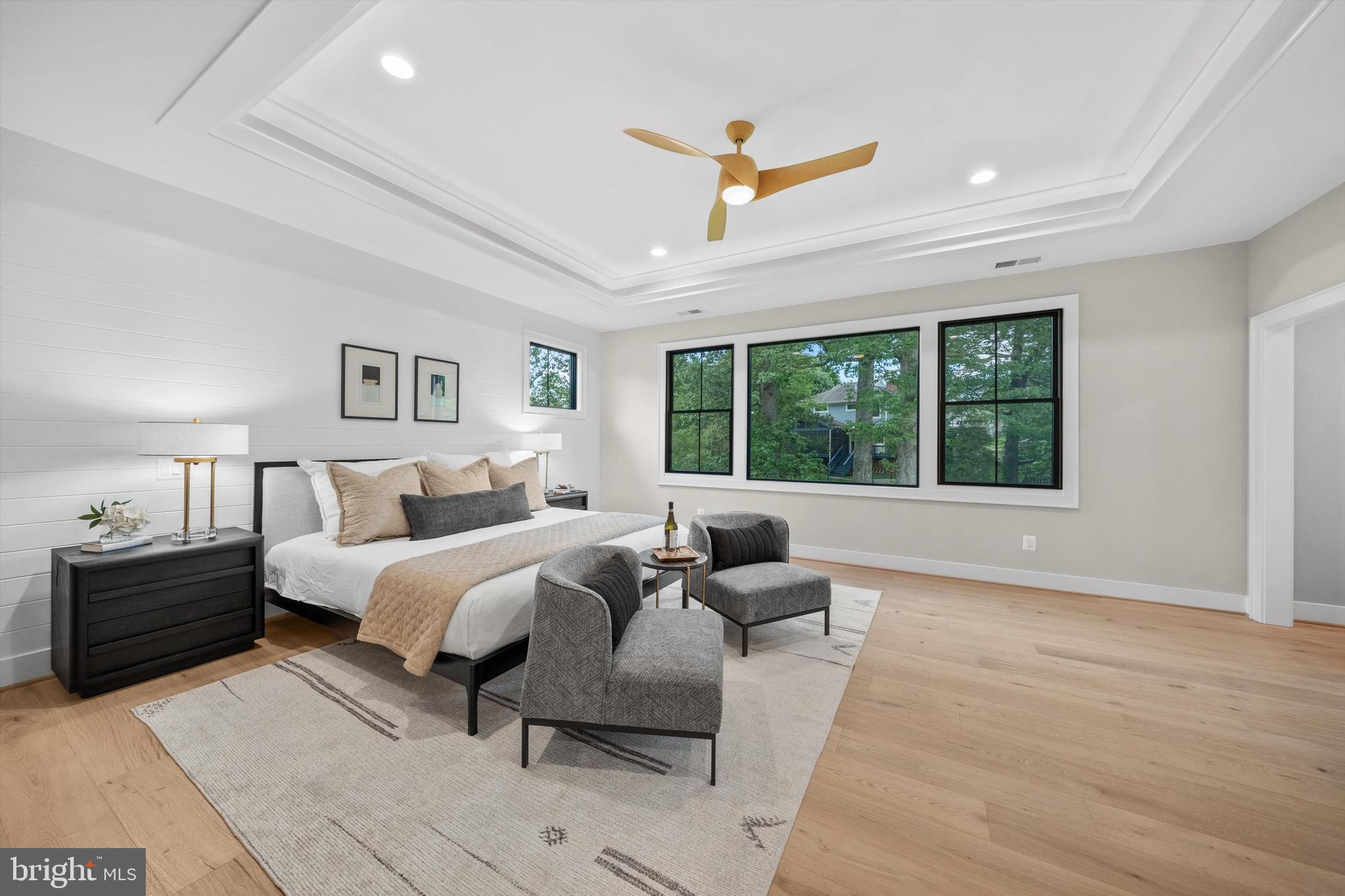 6807 29th Street North Arlington, VA 22213 - Photo 21 of 36 a spacious bedroom with a large bed and a window