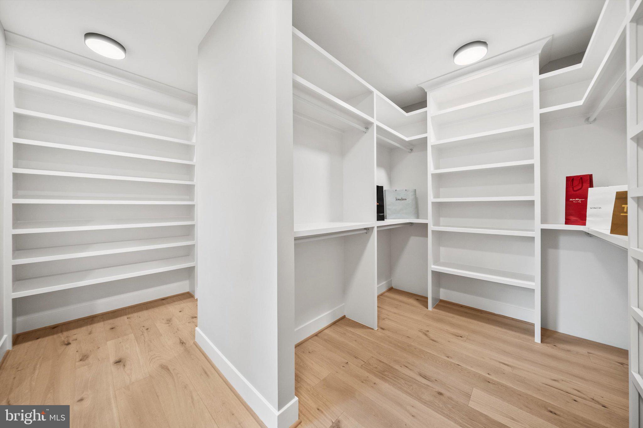 6807 29th Street North Arlington, VA 22213 - Photo 24 of 36 a view of walk in closet with empty racks