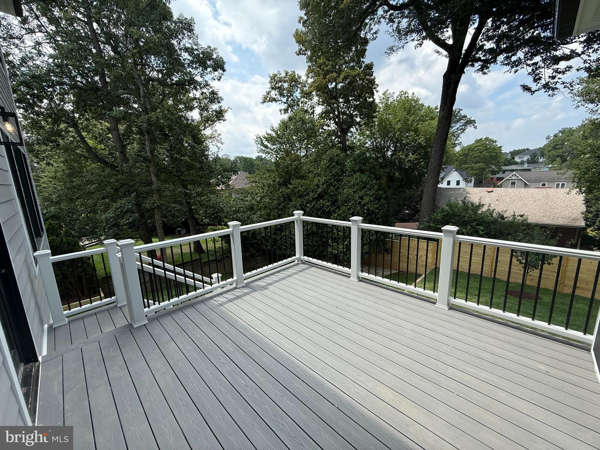 6807 29th Street North Arlington, VA 22213 - Photo 31 of 36 a view of a balcony with wooden floor and fence