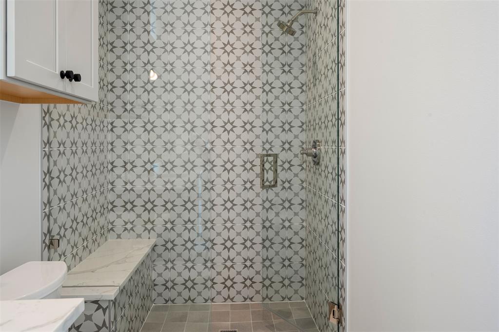455 Sun Valley Mabank, TX 75147 - Photo 27 of 35 a bathroom with a toilet and a shower curtain