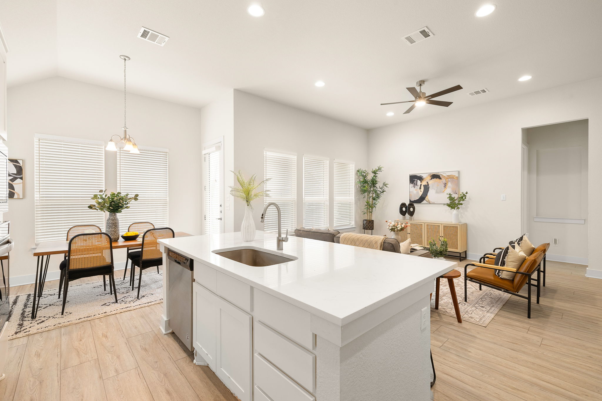 20904 Carries Ranch Road Pflugerville, TX 78660 - Photo 17 of 33 a large white kitchen with a table and chairs