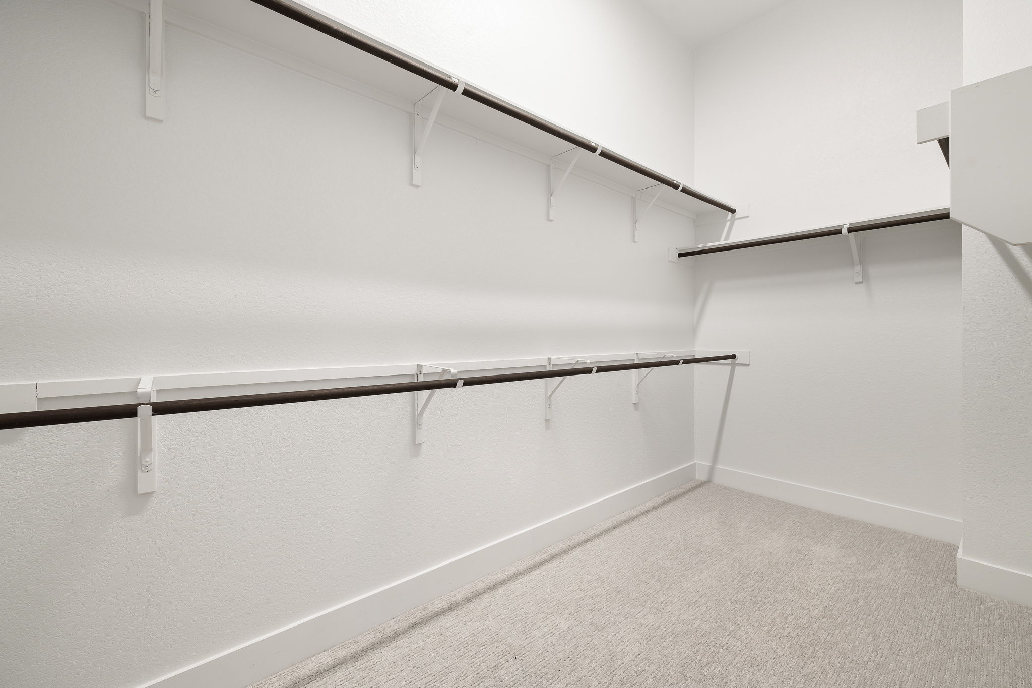 20904 Carries Ranch Road Pflugerville, TX 78660 - Photo 24 of 33 a view of an empty walk in closet