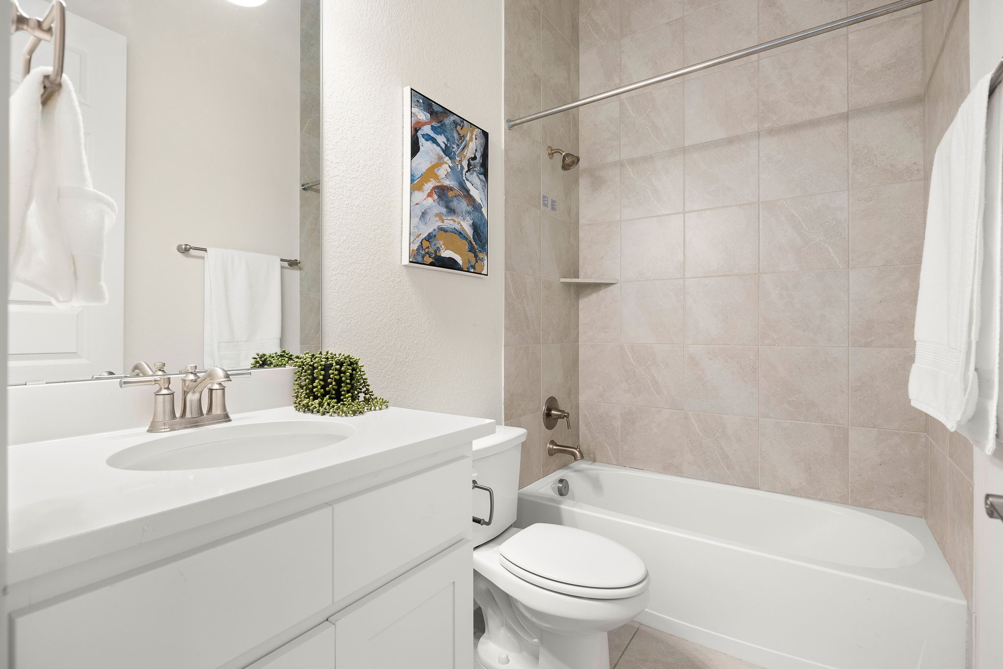 20904 Carries Ranch Road Pflugerville, TX 78660 - Photo 29 of 33 a bathroom with a sink a toilet and a bathtub