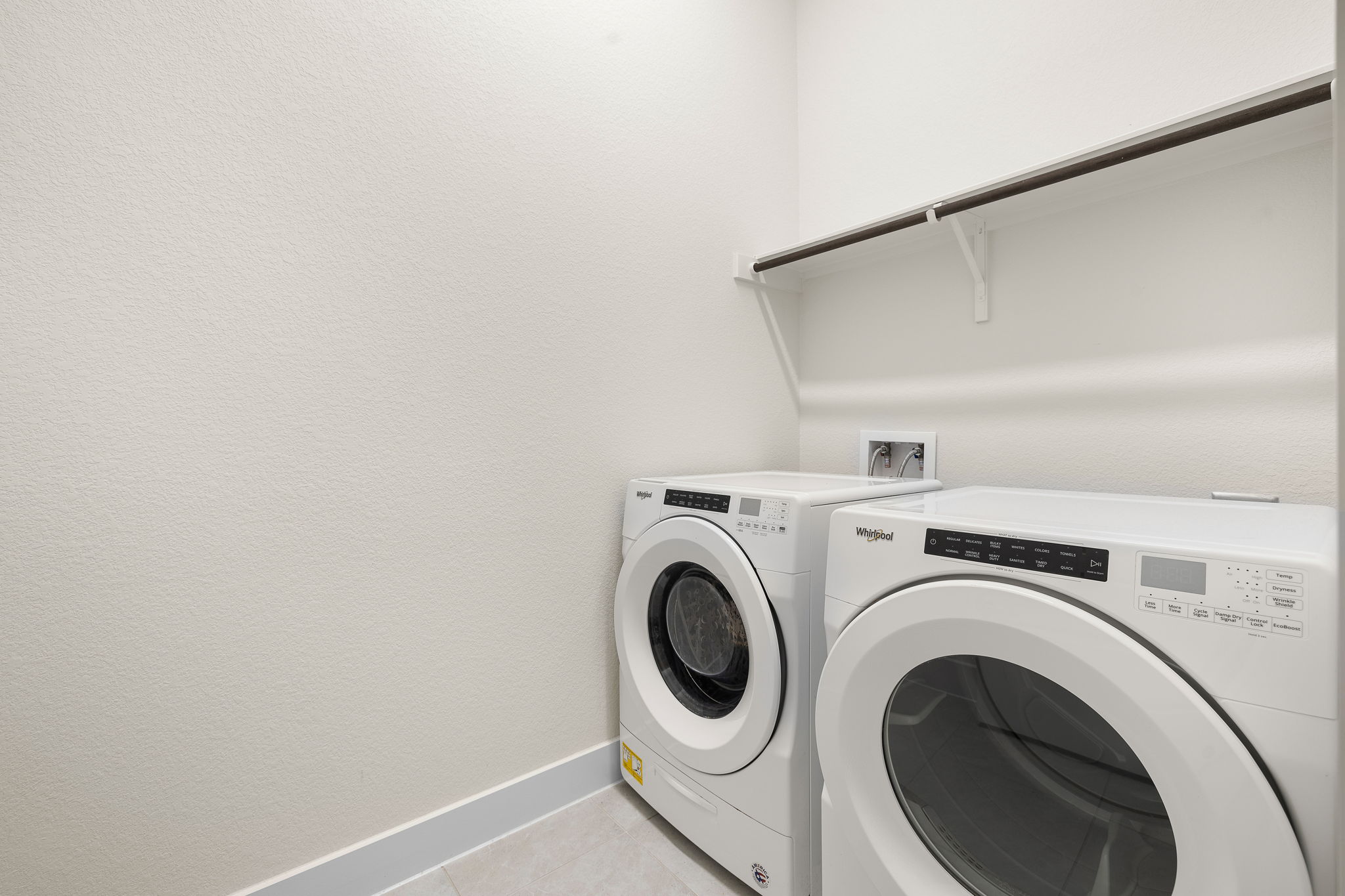 20904 Carries Ranch Road Pflugerville, TX 78660 - Photo 30 of 33 a utility room with dryer and washer
