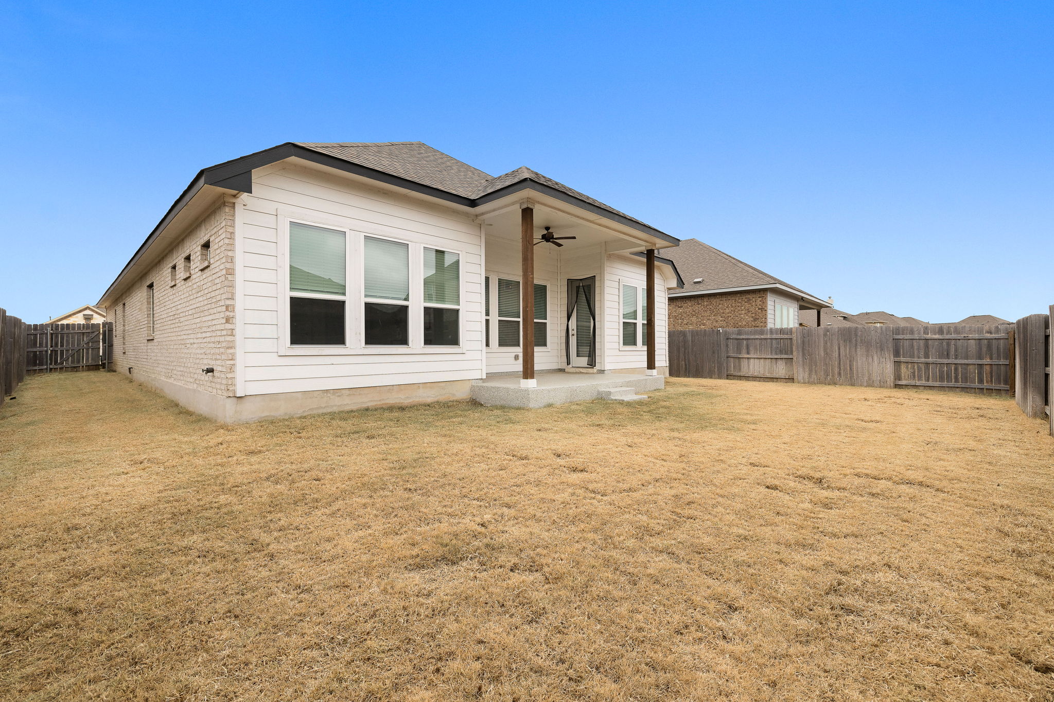 20904 Carries Ranch Road Pflugerville, TX 78660 - Photo 32 of 33 a front view of a house with a yard