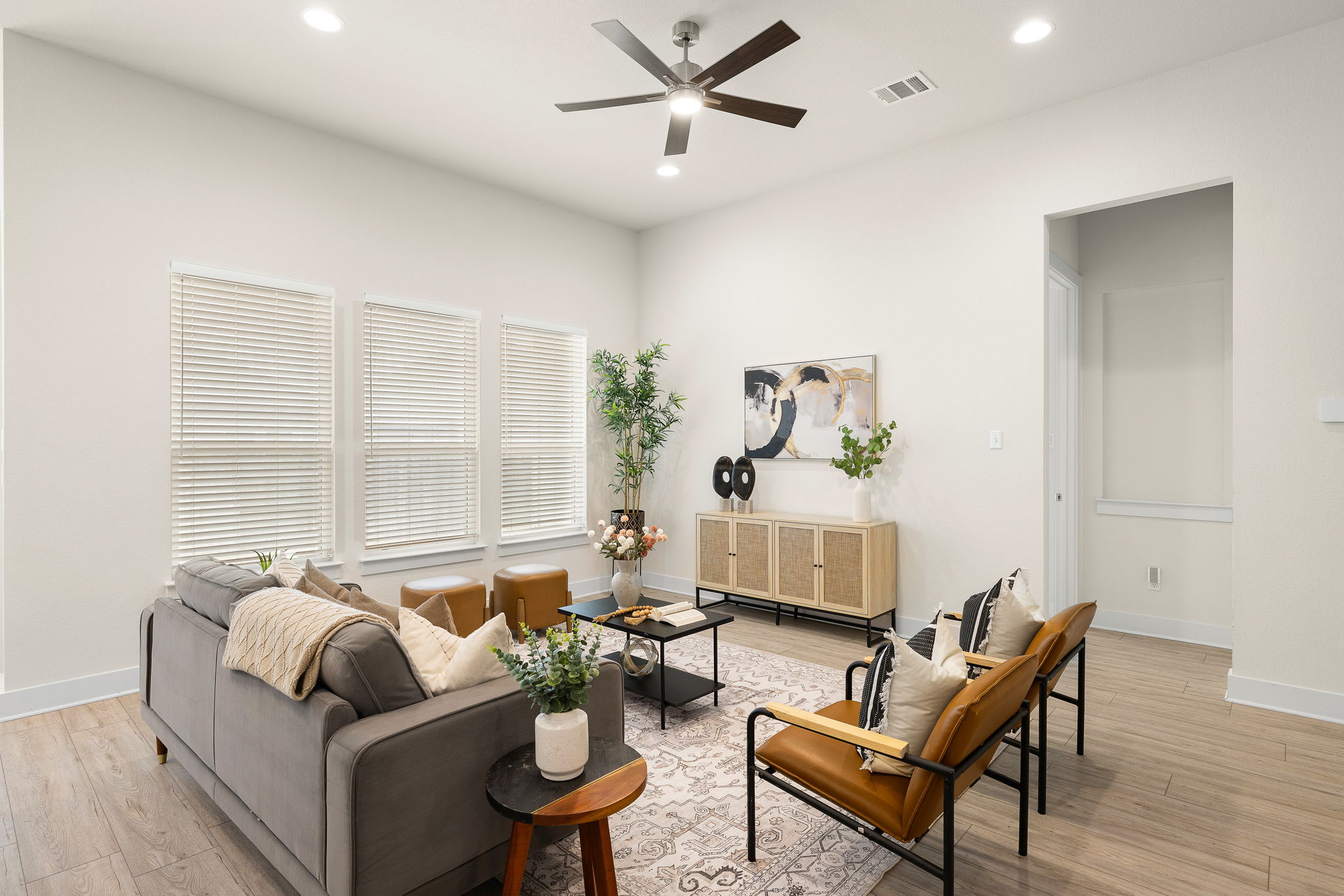 20904 Carries Ranch Road Pflugerville, TX 78660 - Photo 10 of 33 a living room with furniture and a large window