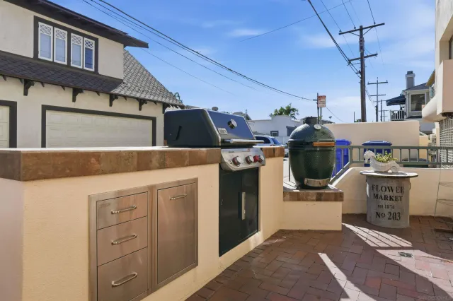 a utility room with sink dryer and washer