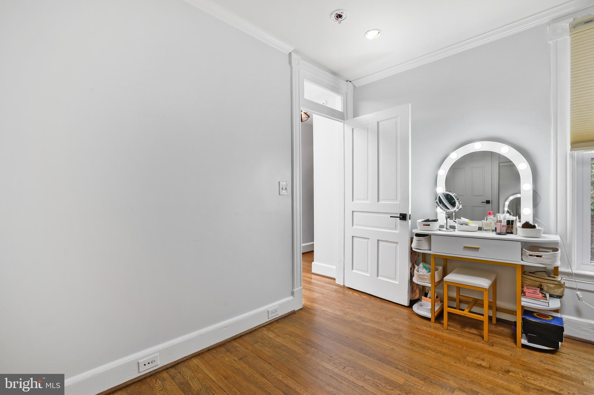 1215 33rd Street Northwest Washington, DC 20007 - Photo 25 of 37 a view of a livingroom with furniture and wooden floor
