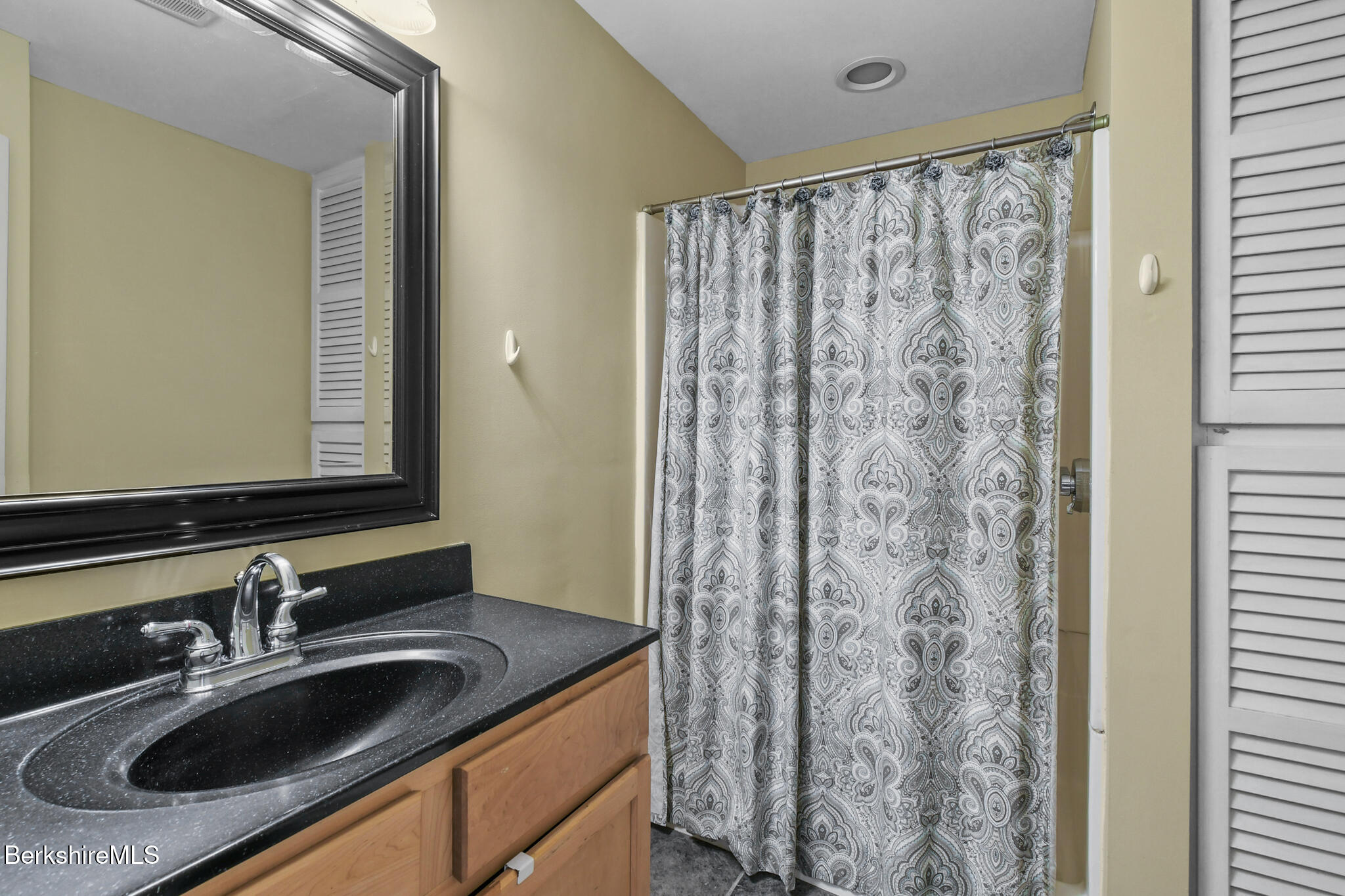 165 High Street Dalton, MA 01226 - Photo 11 of 38 a bathroom with a granite countertop sink and a mirror