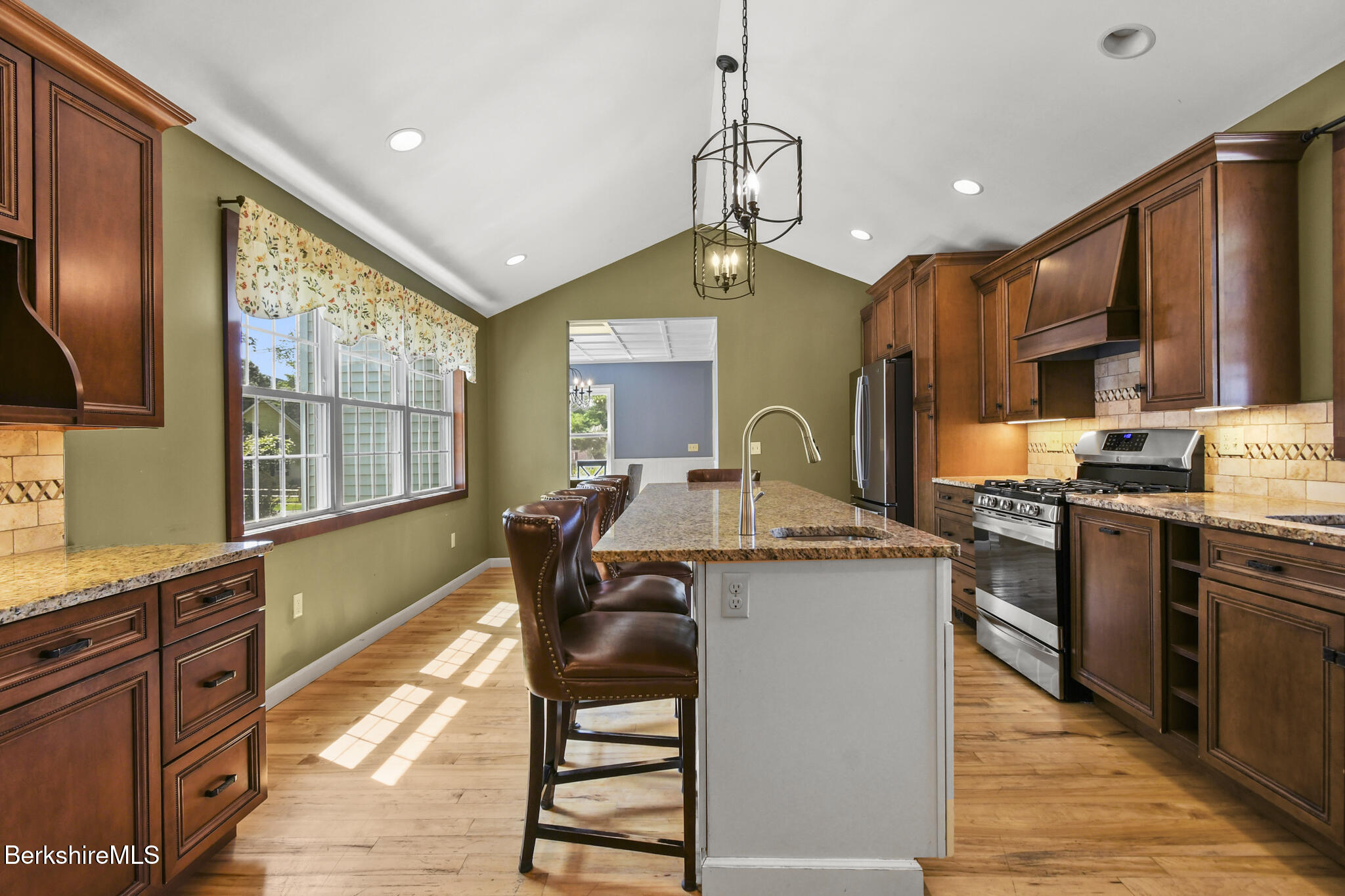 165 High Street Dalton, MA 01226 - Photo 17 of 38 a kitchen with stainless steel appliances granite countertop a sink stove and refrigerator