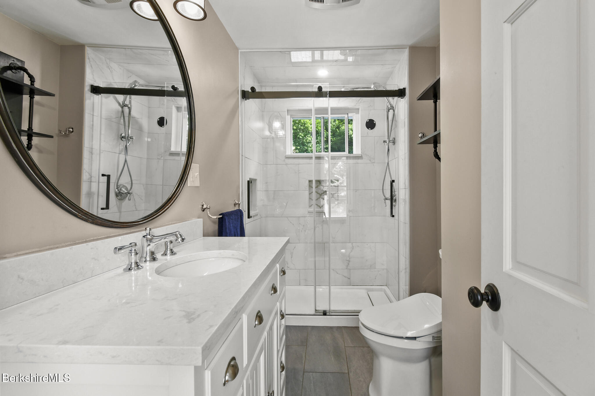 165 High Street Dalton, MA 01226 - Photo 22 of 38 a bathroom with a sink a toilet and shower
