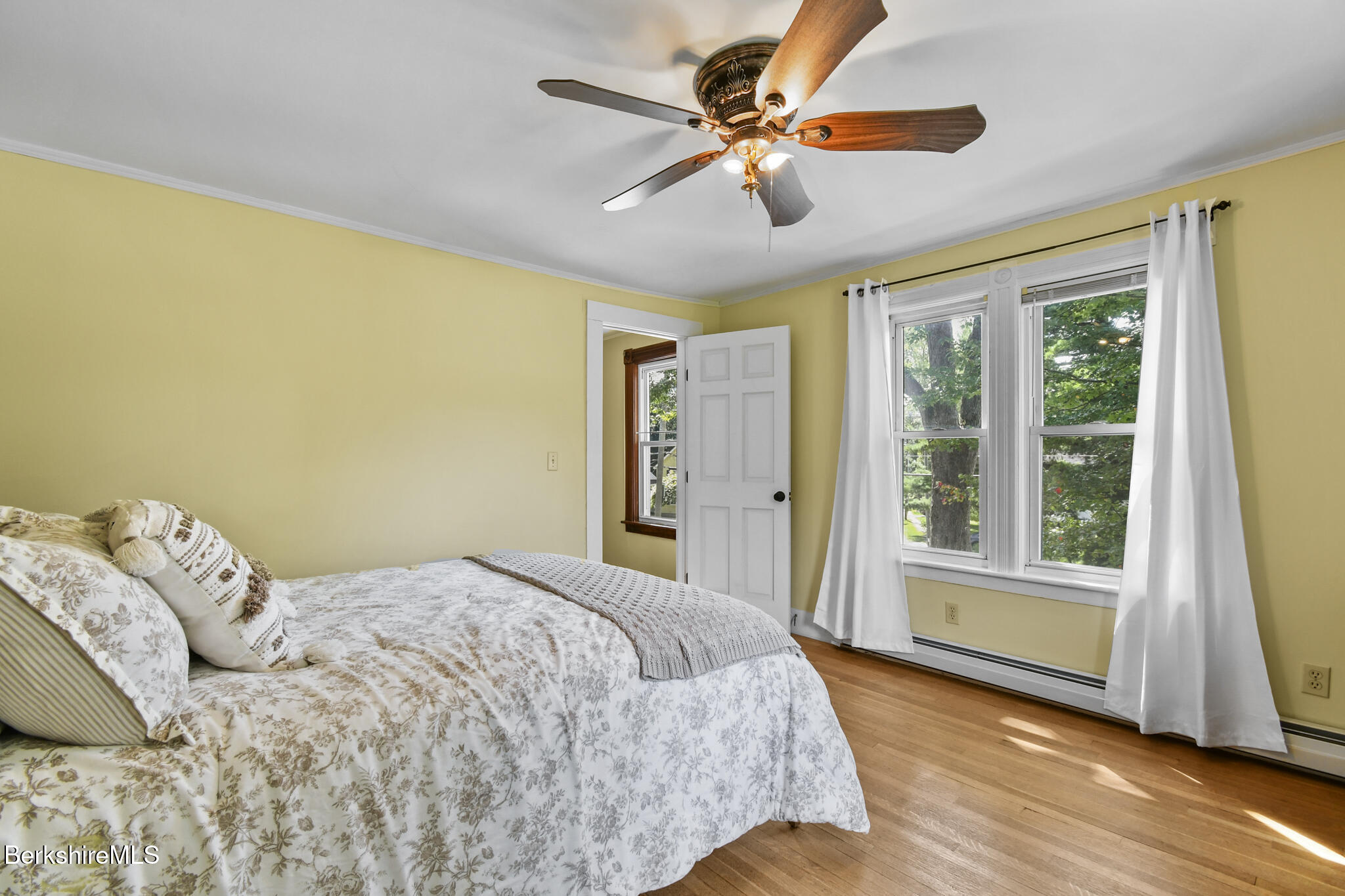 165 High Street Dalton, MA 01226 - Photo 28 of 38 a bedroom with a large bed and a large window