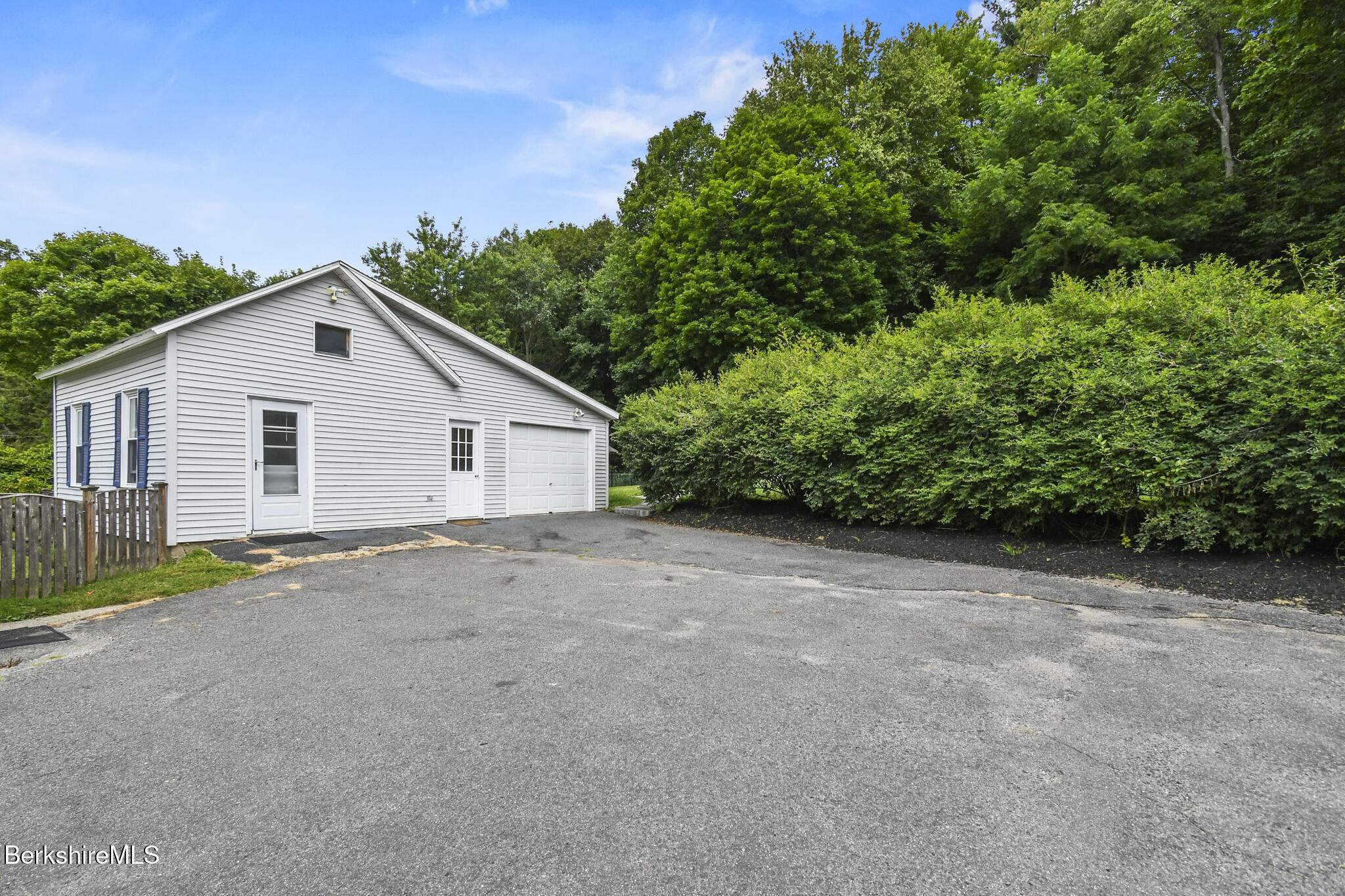 165 High Street Dalton, MA 01226 - Photo 32 of 38 a view of a house with a backyard