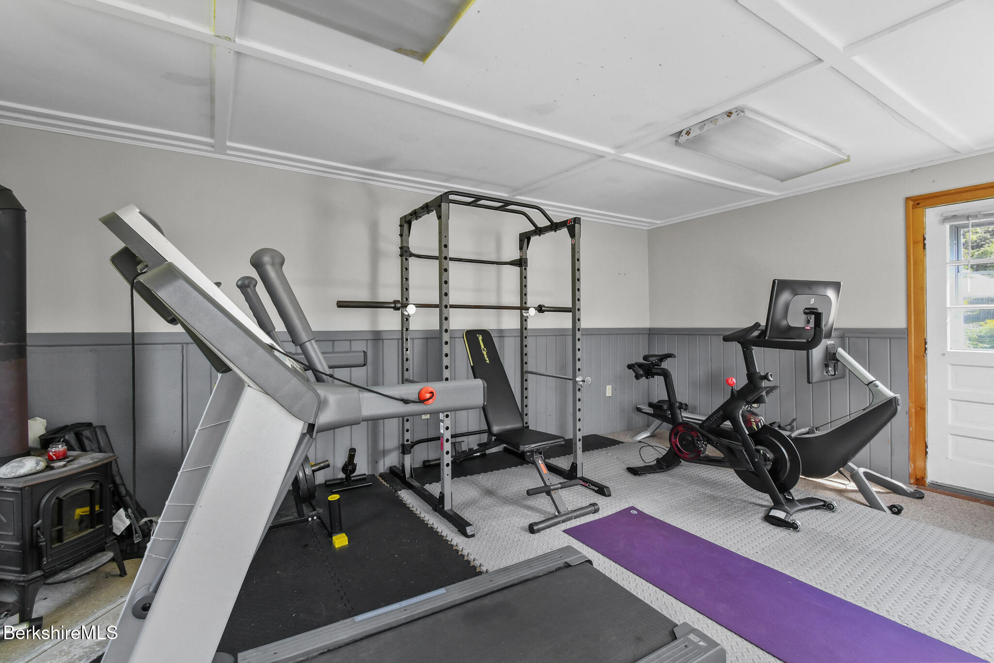 165 High Street Dalton, MA 01226 - Photo 35 of 38 a room with gym equipment and a mirror