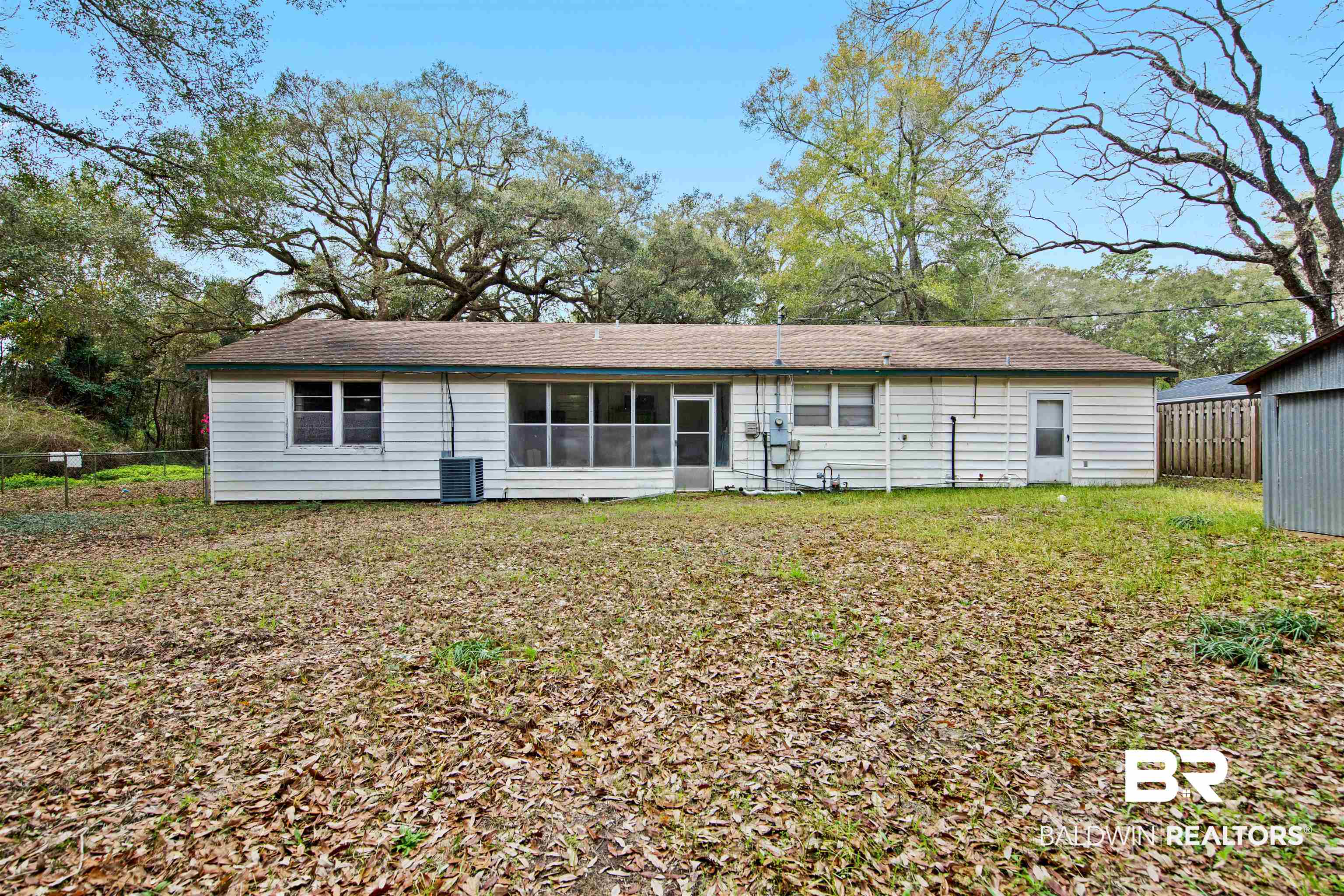 2671 Dawes Road Mobile, AL 36695 - Photo 6 of 11 Back of property featuring a sunroom
