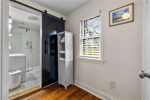a view of bathroom with a toilet and a shower