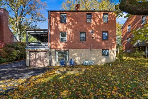 a view of a building with a street