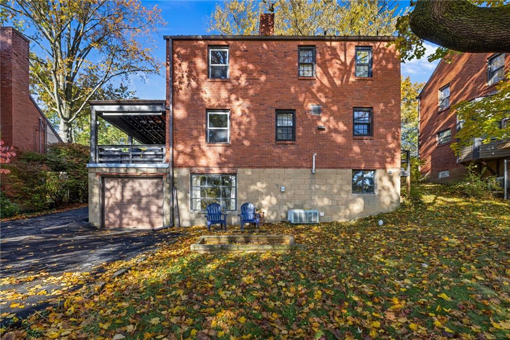 747 Fruithurst Drive Pittsburgh, PA 15228 - Photo 38 of 39 a view of a house with a tree in the yard