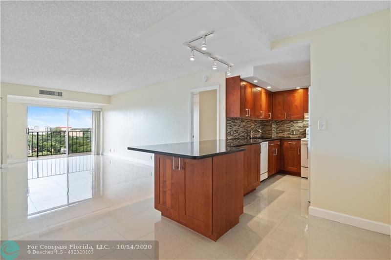 Bright, south facing, open layout kitchen with lots of storage and plenty of counter space.