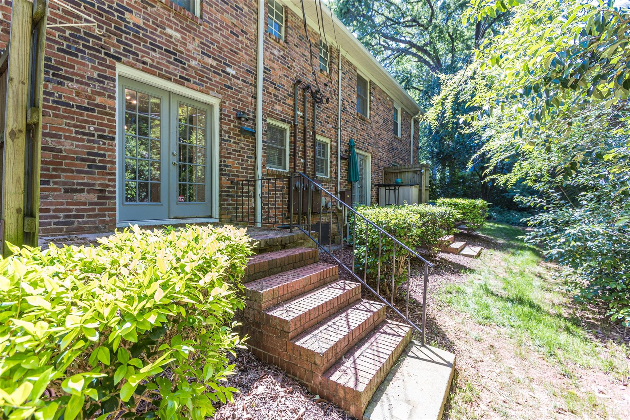 4319 Walker Road, Unit C Charlotte, NC 28211 - Photo 12 of 13 a view of a house with backyard and sitting area