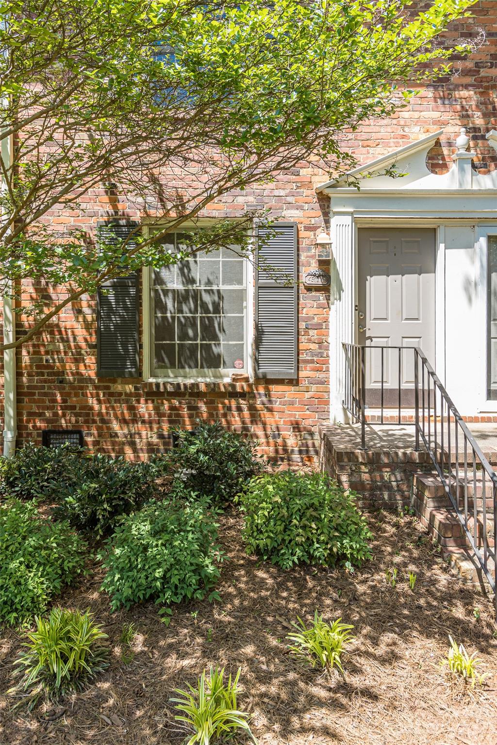 4319 Walker Road, Unit C Charlotte, NC 28211 - Photo 2 of 13 front view of a house with a yard