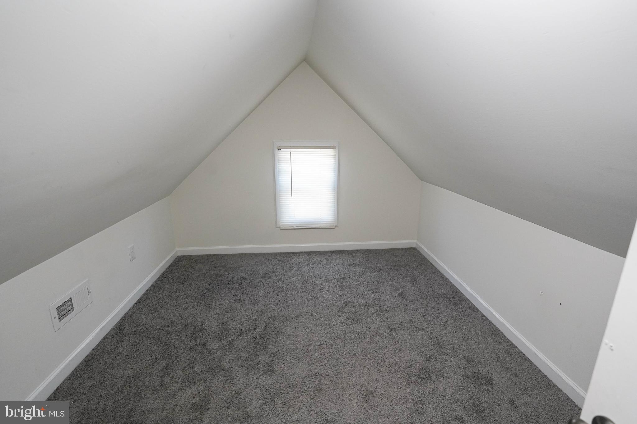 231 Newton Street, Unit B Salisbury, MD 21801 - Photo 11 of 31 an empty room with a window