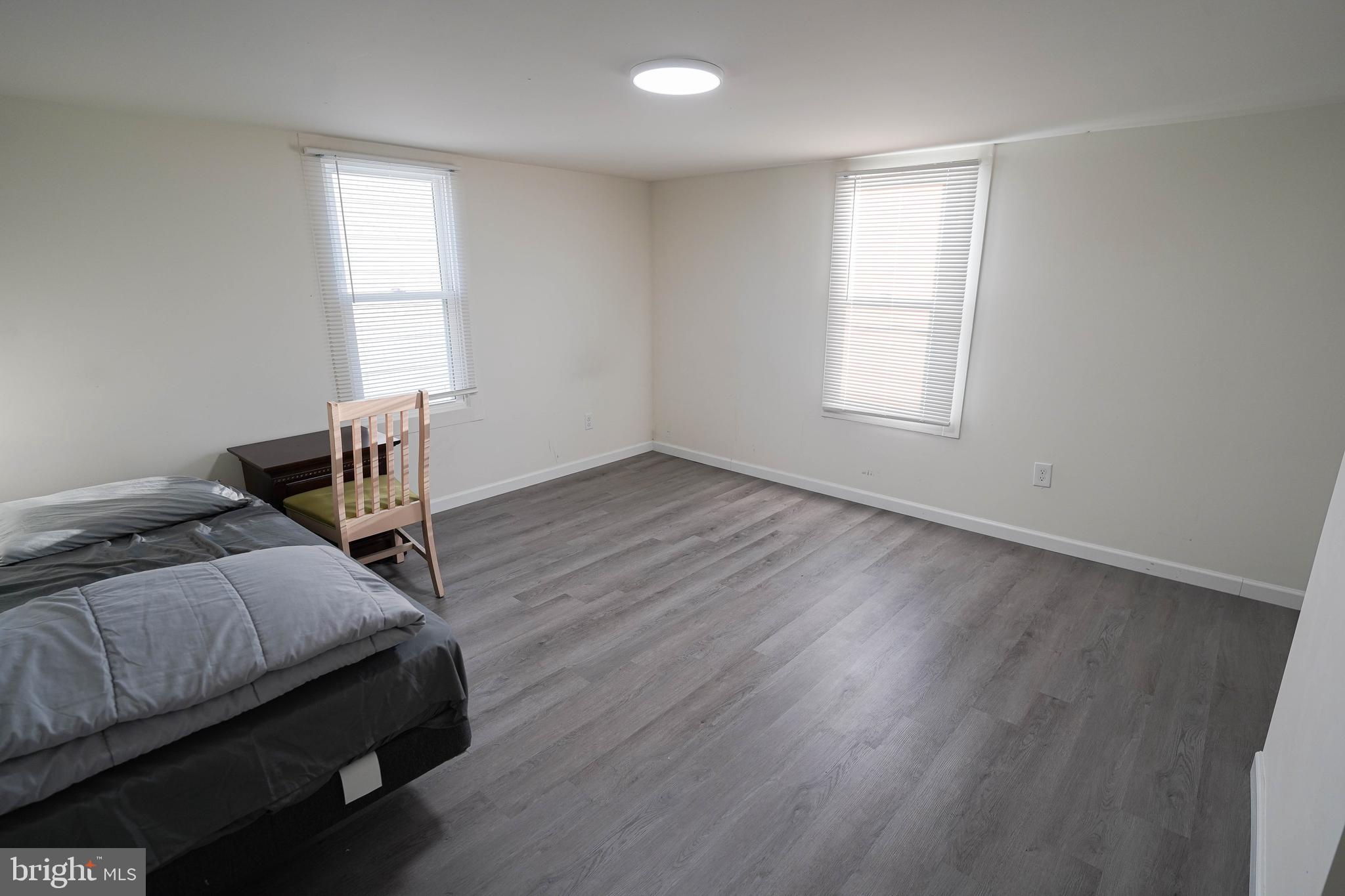 231 Newton Street, Unit B Salisbury, MD 21801 - Photo 14 of 31 a bedroom with bed and window