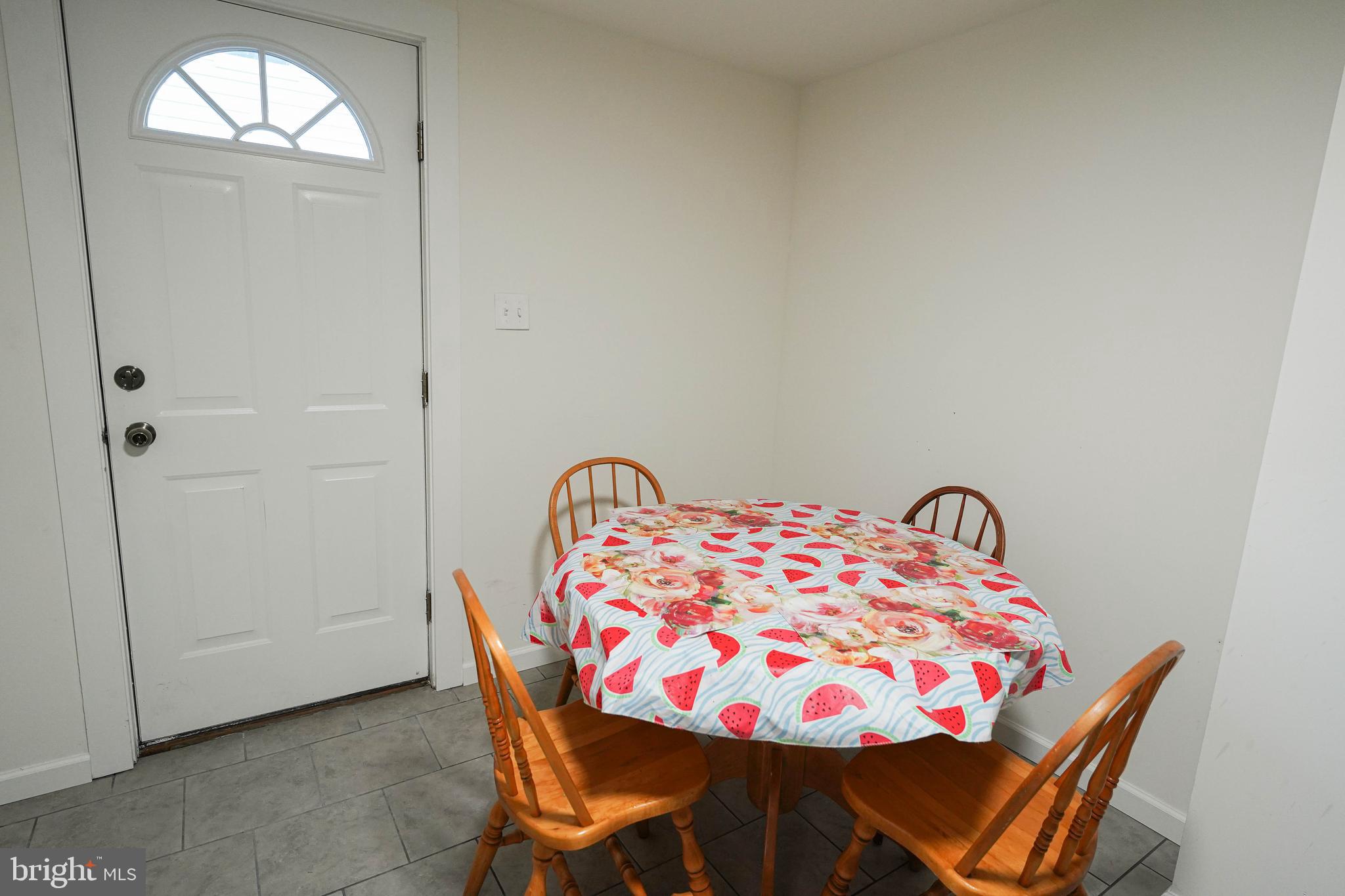 231 Newton Street, Unit B Salisbury, MD 21801 - Photo 31 of 31 a bedroom with a bed and a table in it