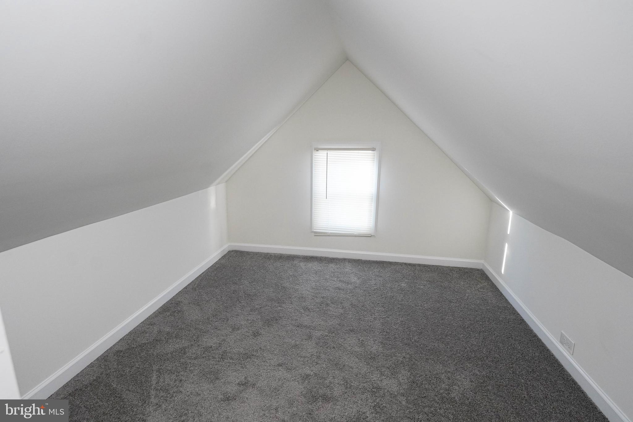 231 Newton Street, Unit B Salisbury, MD 21801 - Photo 9 of 31 a view of empty room with window