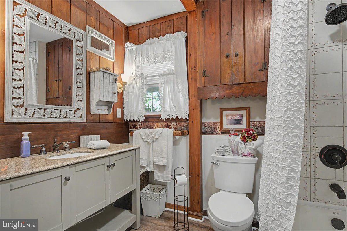 1010 Red Lion Road New Castle, DE 19720 - Photo 25 of 45 a bathroom with a toilet sink and mirror