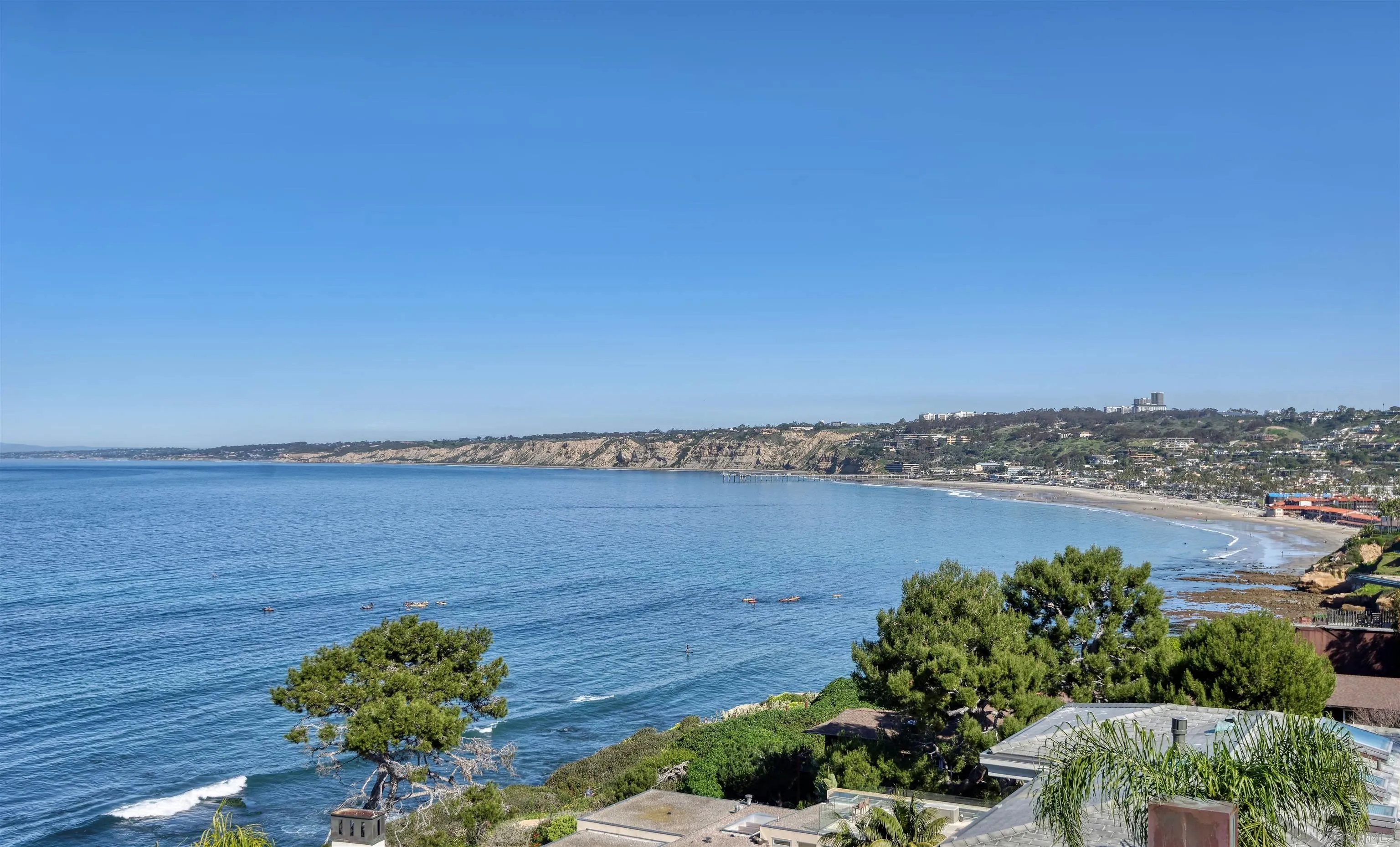 7825 Prospect Place La Jolla, CA 92037 - Photo 30 of 32 a view of a lake with a mountain in the background