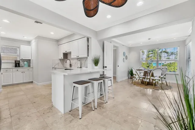 a kitchen with counter and workspace