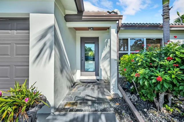 a front view of a house with a porch